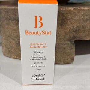 BeautyStat Universal C Skin Refiner - Vibrant Orange and Crisp White